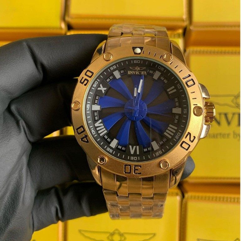 Relogio masculino giratorio invicta dourado resistente agua