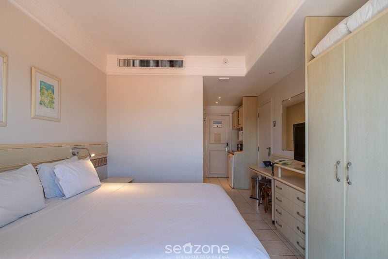 Studio pé na areia com vista mar e hidromassagem - Jurerê Beach Village